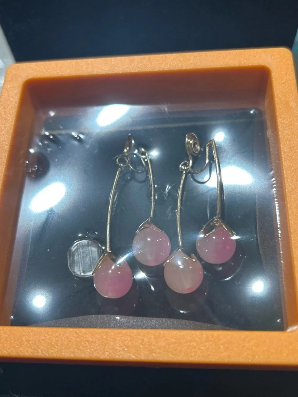 Pink clip on earrings